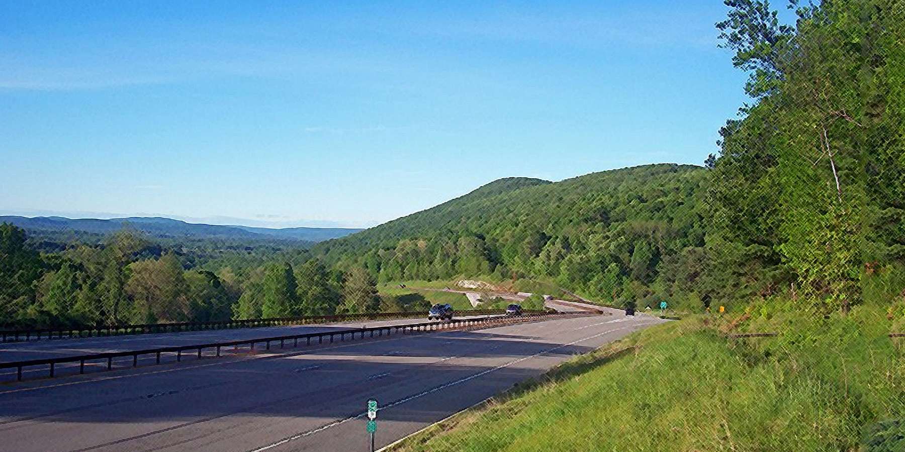 A Photo of the Taconic State Parkway View at Miller Hill Road Exit with Cars on Highway in Stormville, East Fishkill, New York A Photo of the Taconic State Parkway View at Miller Hill Road Exit with Cars on Highway in Stormville, East Fishkill, New York