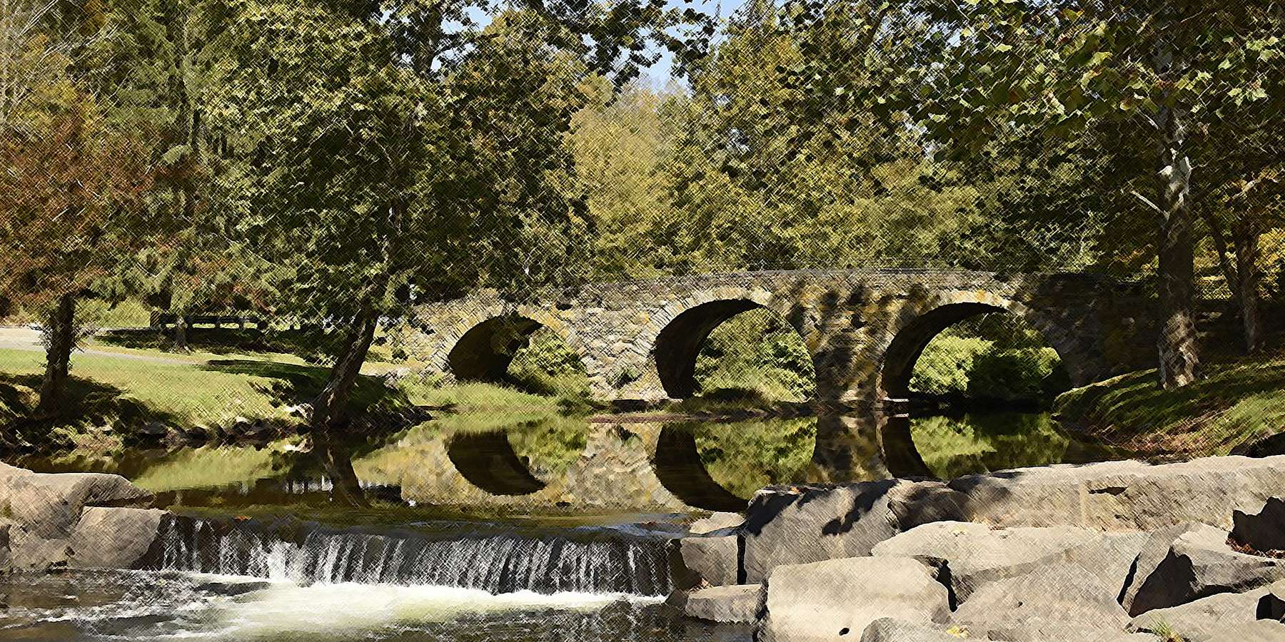 A photo of Kenoza Lake, Stone Arch Bridge Waterfall, New York A photo of Kenoza Lake, Stone Arch Bridge Waterfall, New York