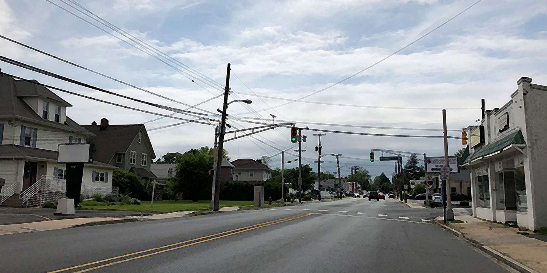 A photo of Monmouth County Route 537 on a sunny day with cars on the road A photo of Monmouth County Route 537 on a sunny day with cars on the road
