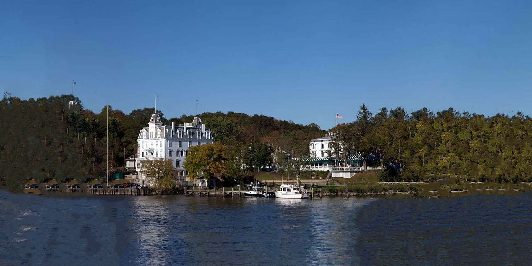 Photo of the Connecticut River at the Goodspeed Opera House, East Haddam, Connecticut, with two white boats Photo of the Connecticut River at the Goodspeed Opera House, East Haddam, Connecticut, with two white boats