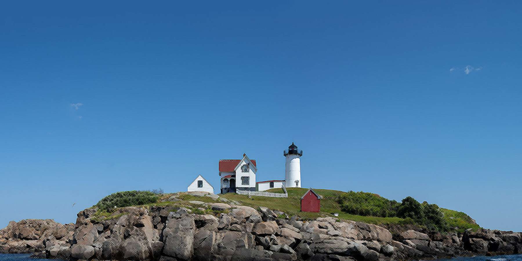 Photo of a lighthouse in Cape Neddick, Maine Photo of a lighthouse in Cape Neddick, Maine