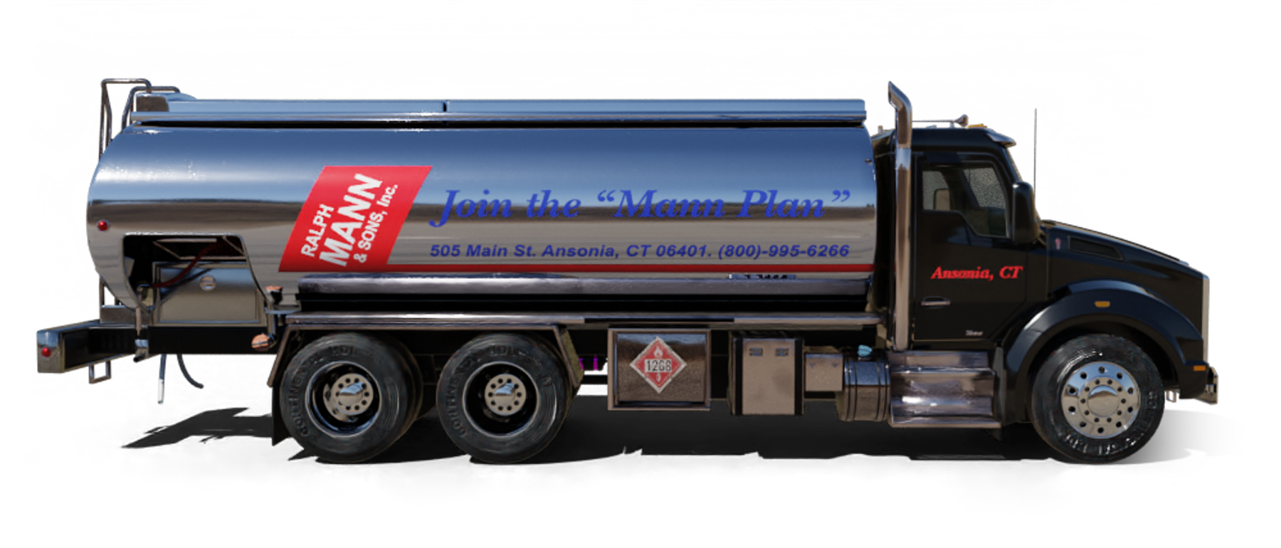 B & H Oil's Heating Oil Truck B & H Oil's Heating Oil Truck parked in front of barbar shop