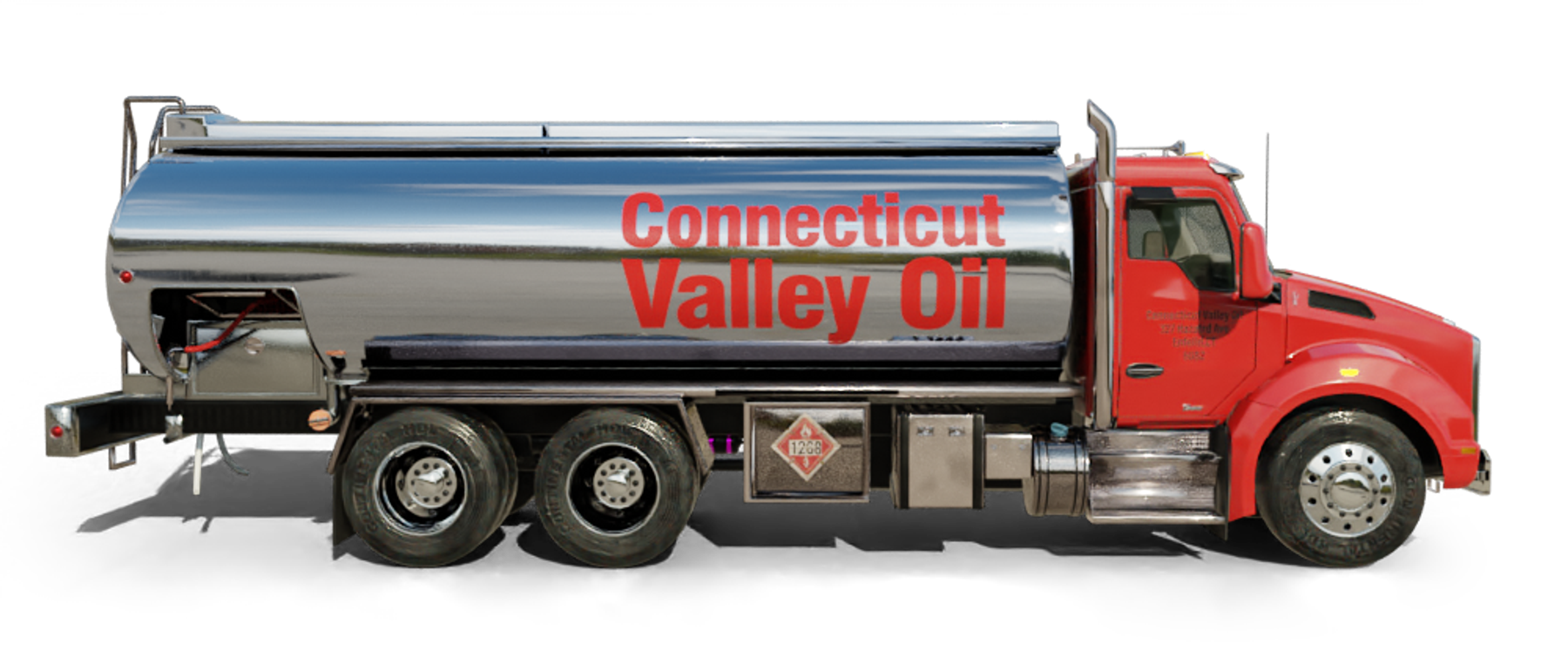 B & H Oil's Heating Oil Truck B & H Oil's Heating Oil Truck parked in front of barbar shop