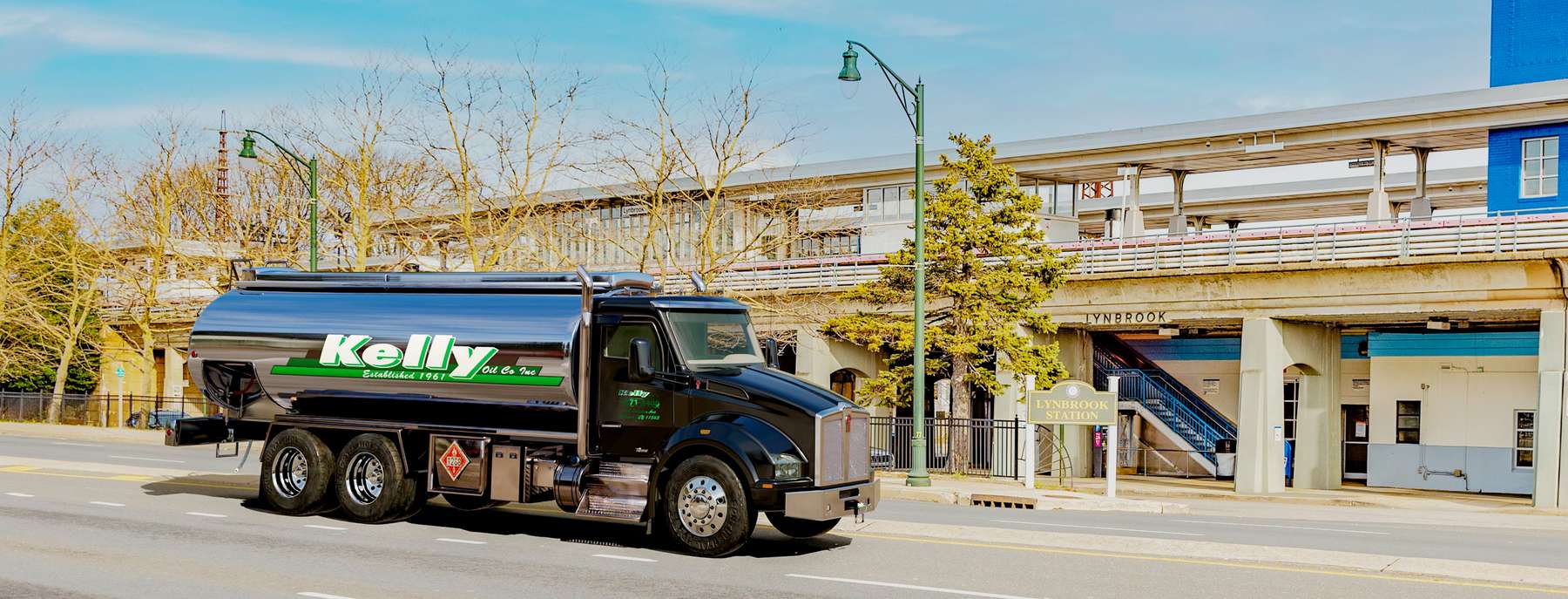 Long Island Heating Oil Heating Oil Truck Long Island Heating Oil residential home heating oil truck in a parking lot in Islip Terrace, Long Island, New York delivering fuel oil.