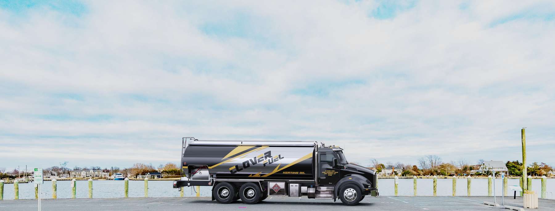 Clover Fuel Heating Oil Truck Clover Fuel residential home heating oil truck outside a classic shingle style mansion in Bay Shore, Long Island, New York delivering fuel oil.