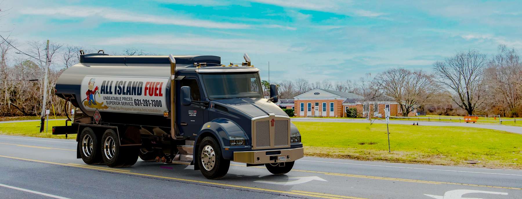 All Island Heating Oil Truck  All Island residential home heating oil truck on a sunny day in Shirley, Long Island, New York delivering fuel oil.