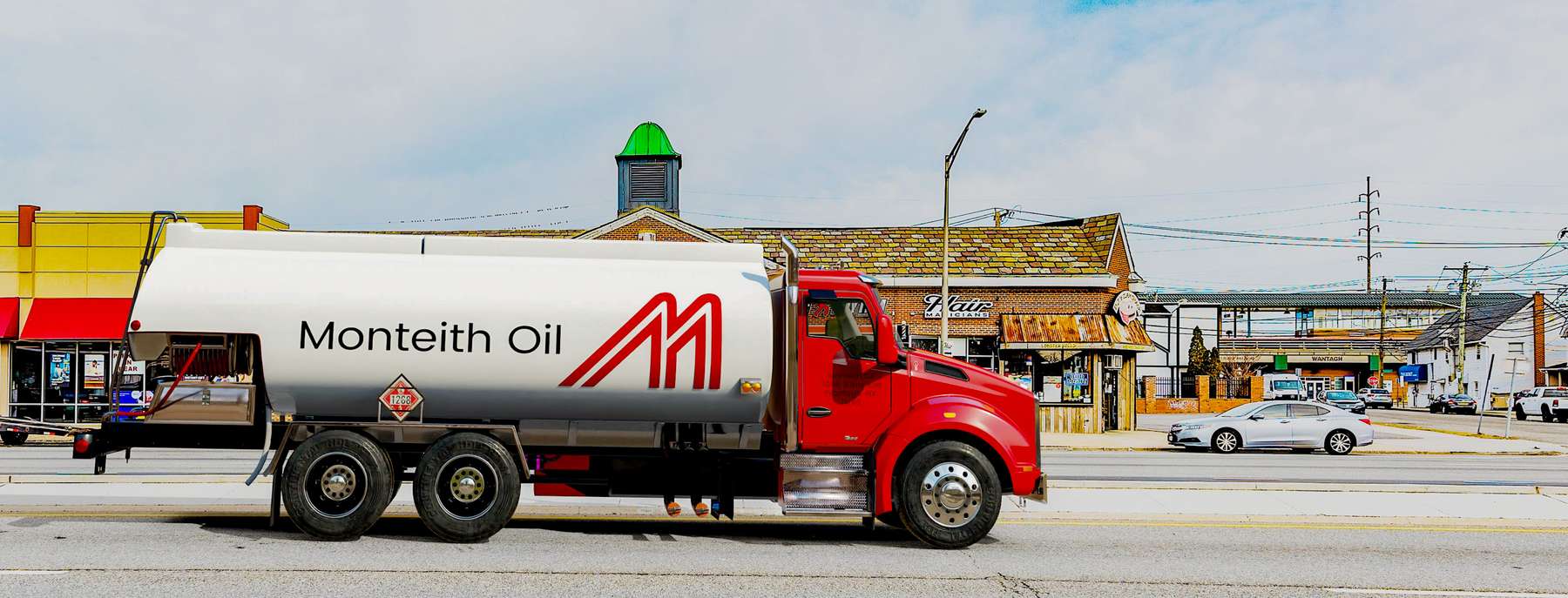 Mulry Fuel Heating Oil Truck Mulry Fuel residential home heating oil truck on a sunny afternoon parked on Coxtie Green Rd in Brentwood, Long Island, New York delivering fuel oil.