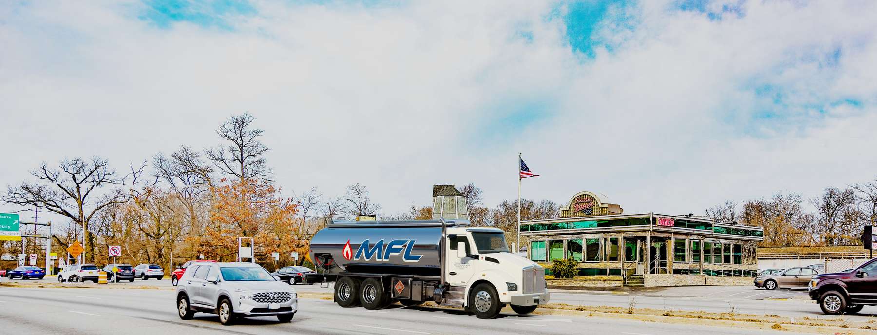 Ben Oil Heating Oil Truck Ben Oil residential home heating oil truck in a recreational area with bike racks and snow plows in Lindenhurst, Long Island, New York delivering fuel oil.