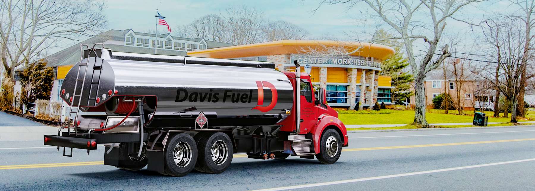Demarest Holding Heating Oil Truck Demarest Holding residential home heating oil truck on the street parked in front of two homes in Baldwin, Long Island, New York delivering fuel oil.