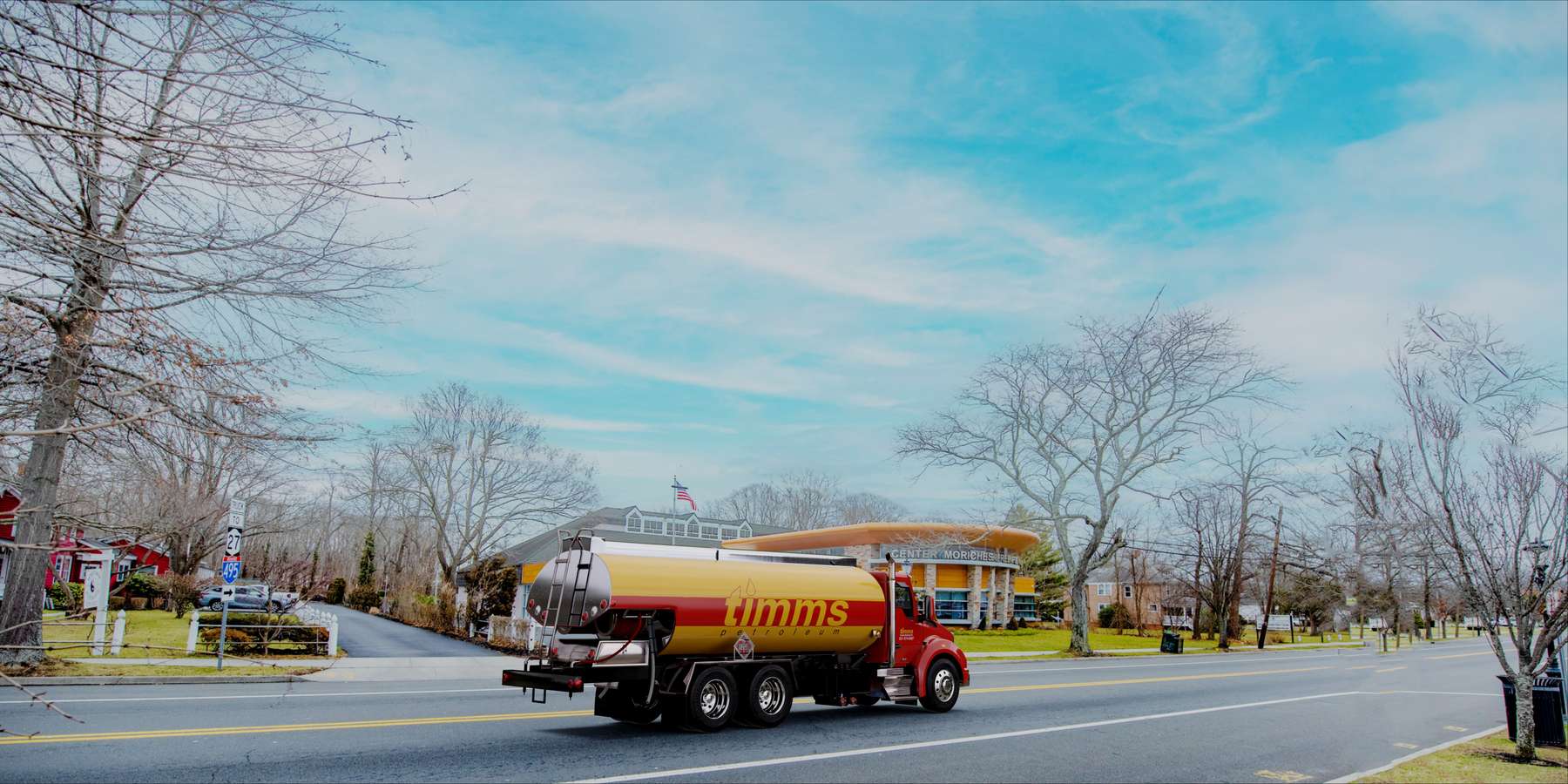Residential heating oil truck at the public library in Center Moriches, Long Island, New York delivering fuel oil. Residential heating oil truck at the public library in Center Moriches, Long Island, New York delivering fuel oil.