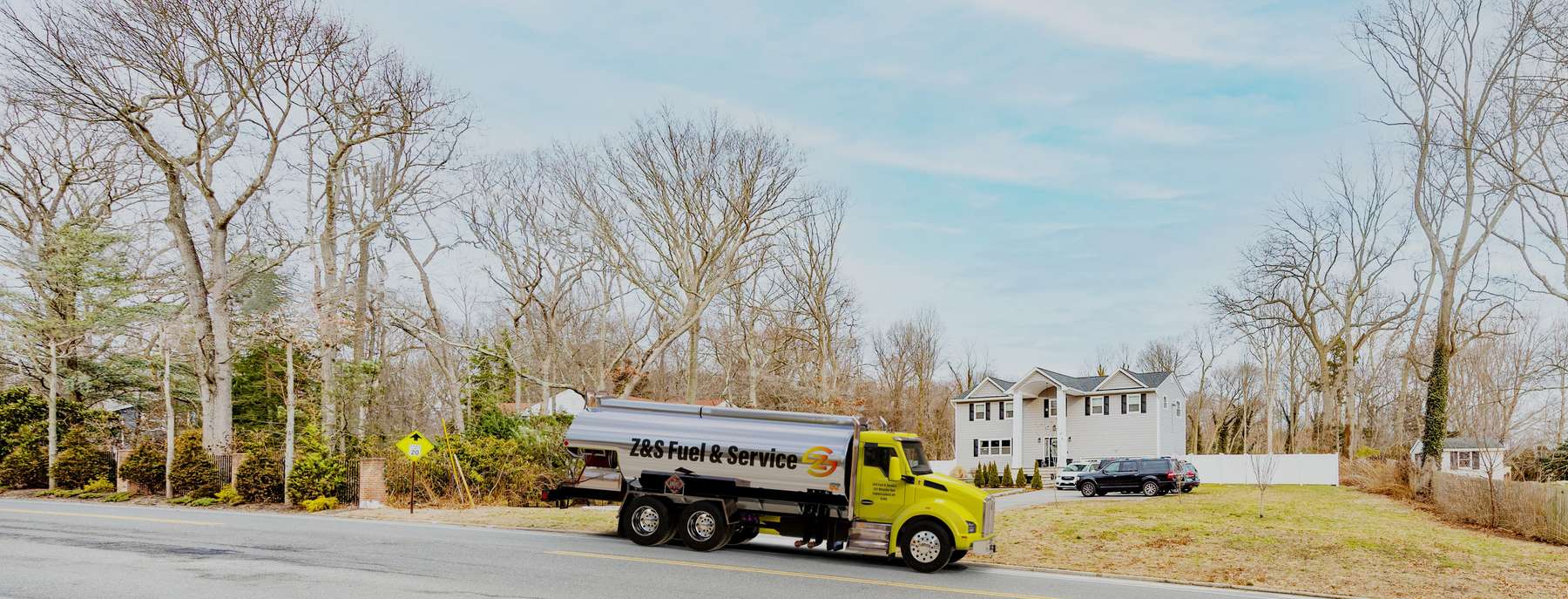 Z&S Fuel & Service Heating Oil Truck Z&S Fuel & Service residential home heating oil truck parked in front of a gray house in Huntington, Long Island, New York delivering fuel oil.