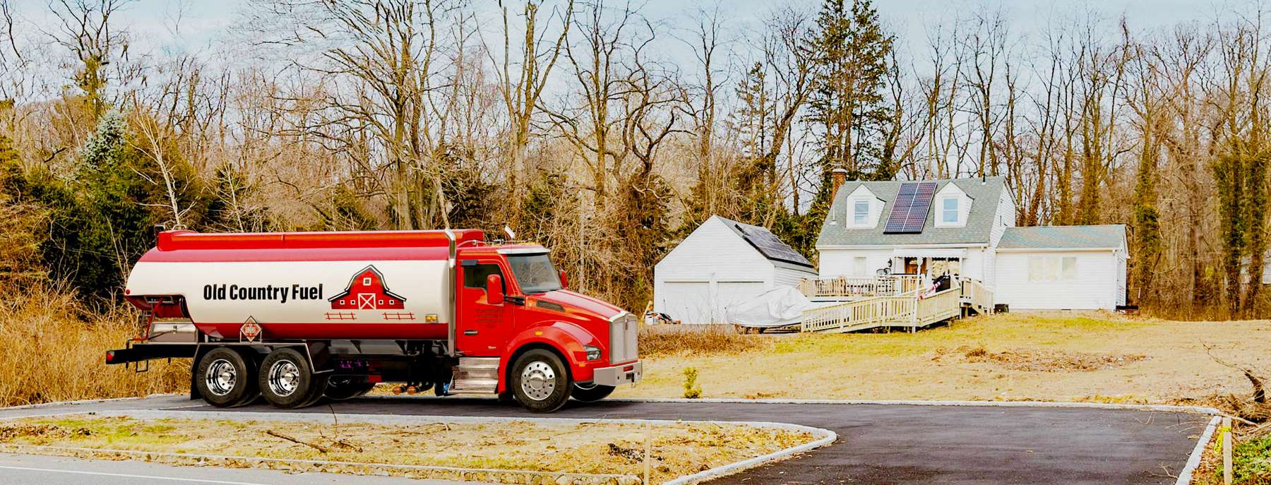 NYC Fuel Service Heating Oil Truck NYC Fuel Service residential home heating oil truck at the intersection of Hull St and Loftus Ave in Oceanside, Long Island, New York delivering fuel oil.