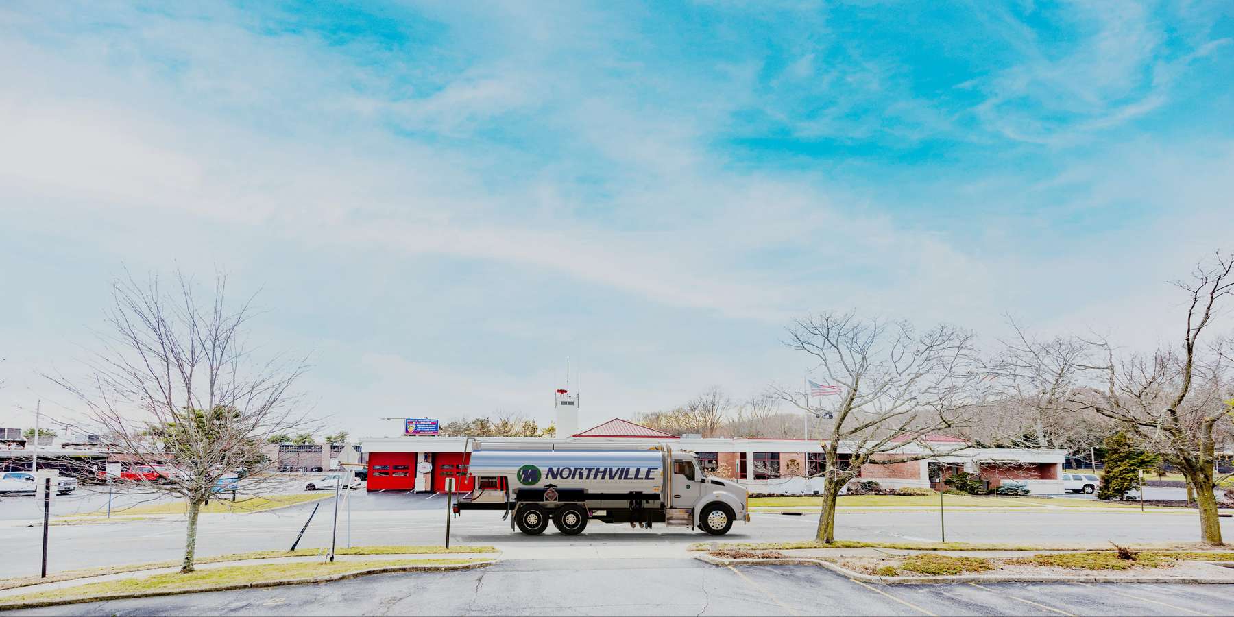 Residential heating oil truck parked at the firehouse on Amityville Rd in Melville, Long Island, New York delivering fuel oil. Residential heating oil truck parked at the firehouse on Amityville Rd in Melville, Long Island, New York delivering fuel oil.