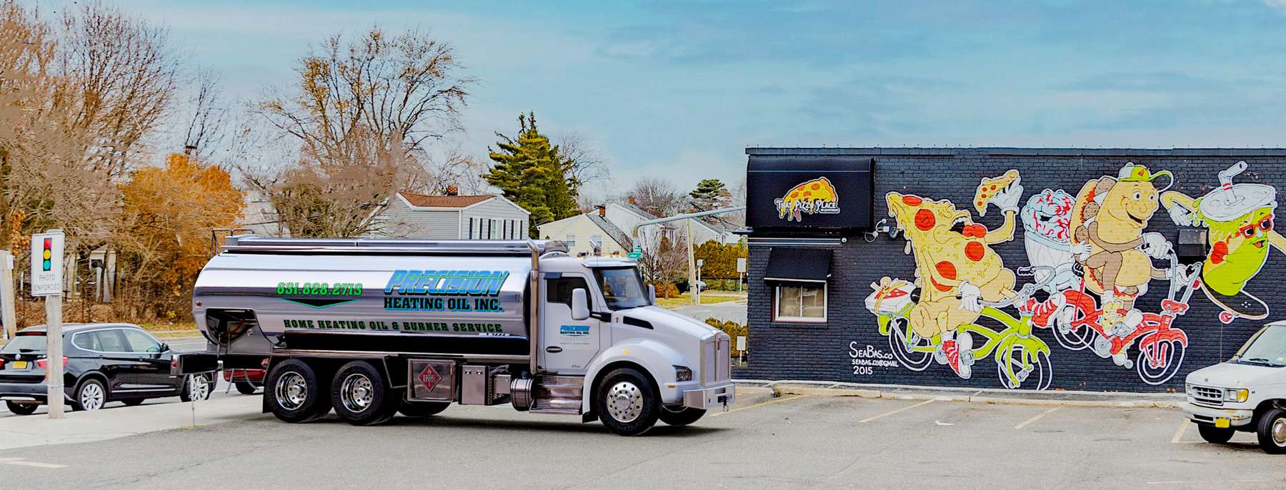 Precision Heating Heating Oil Truck Precision Heating residential home heating oil truck on Wantagh Ave in Levittown, Long Island, New York delivering fuel oil.
