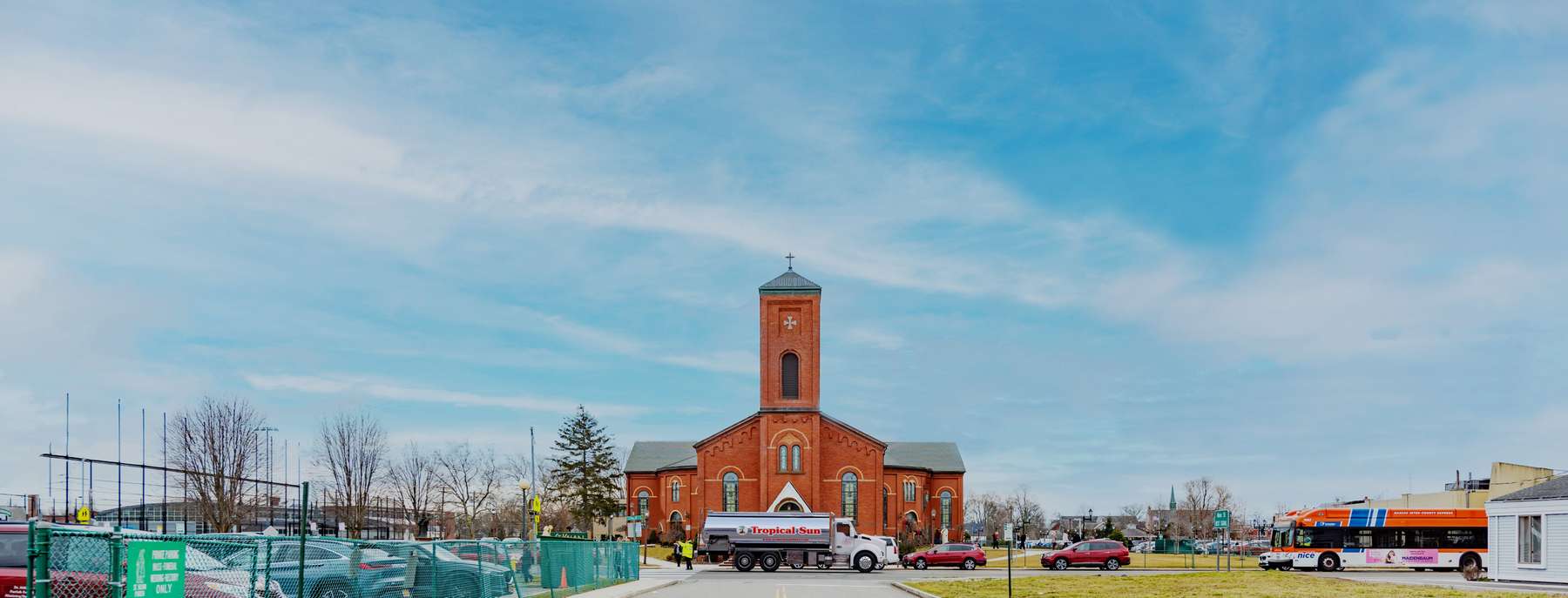 Unique Fuel Oil Heating Oil Truck  Unique Fuel Oil residential home heating oil truck at the entrance portico in Brentwood, Long Island, New York delivering fuel oil.