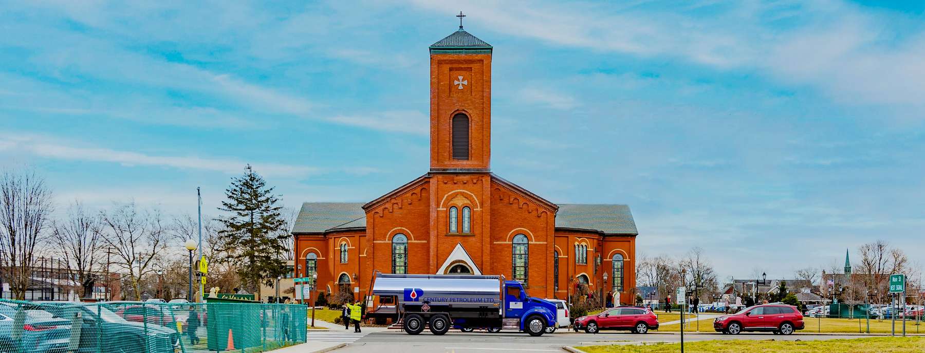 Century Petroleum Heating Oil Truck Century Petroleum residential home heating oil truck in the street outside St Kilian Parish in Farmingdale, Long Island, New York delivering fuel oil.