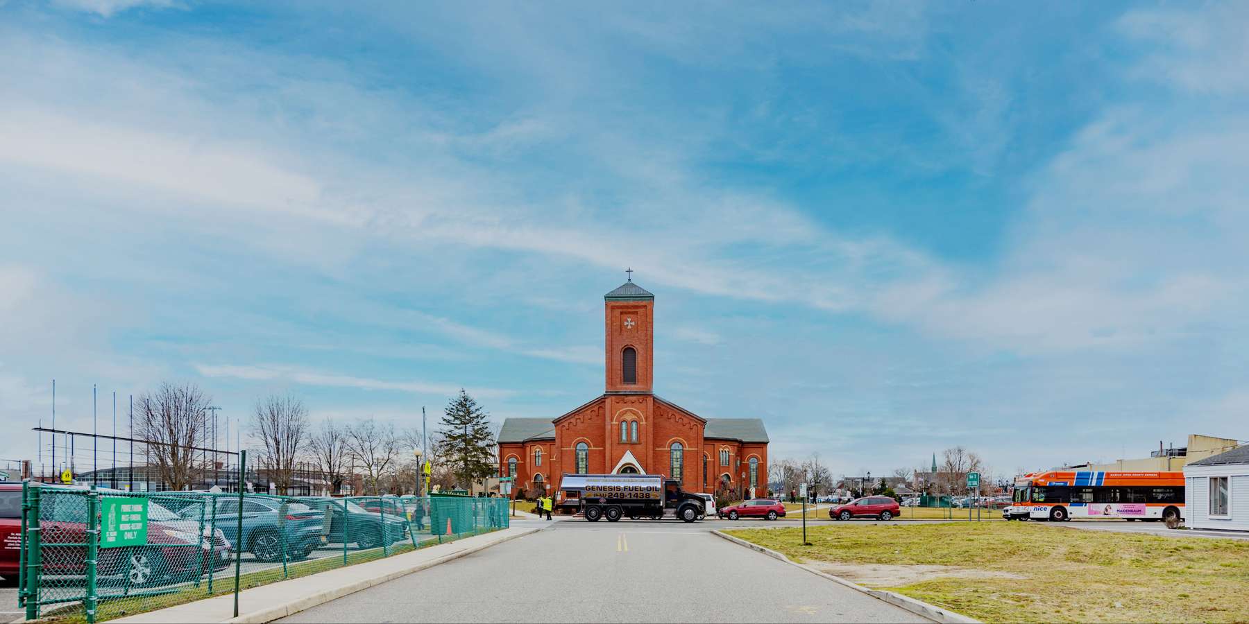 Residential heating oil truck parked on Elizabeth St in Farmingdale, Long Island, New York delivering fuel oil. Residential heating oil truck parked on Elizabeth St in Farmingdale, Long Island, New York delivering fuel oil.