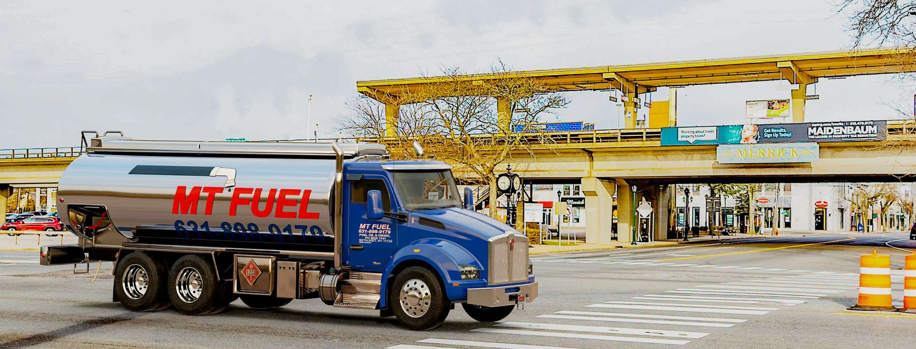 M.T. Fuel Heating Oil Truck M.T. Fuel residential home heating oil truck at the intersection of NY 27 East and Hewlett Blvd in Merrick, Long Island, New York delivering fuel oil.