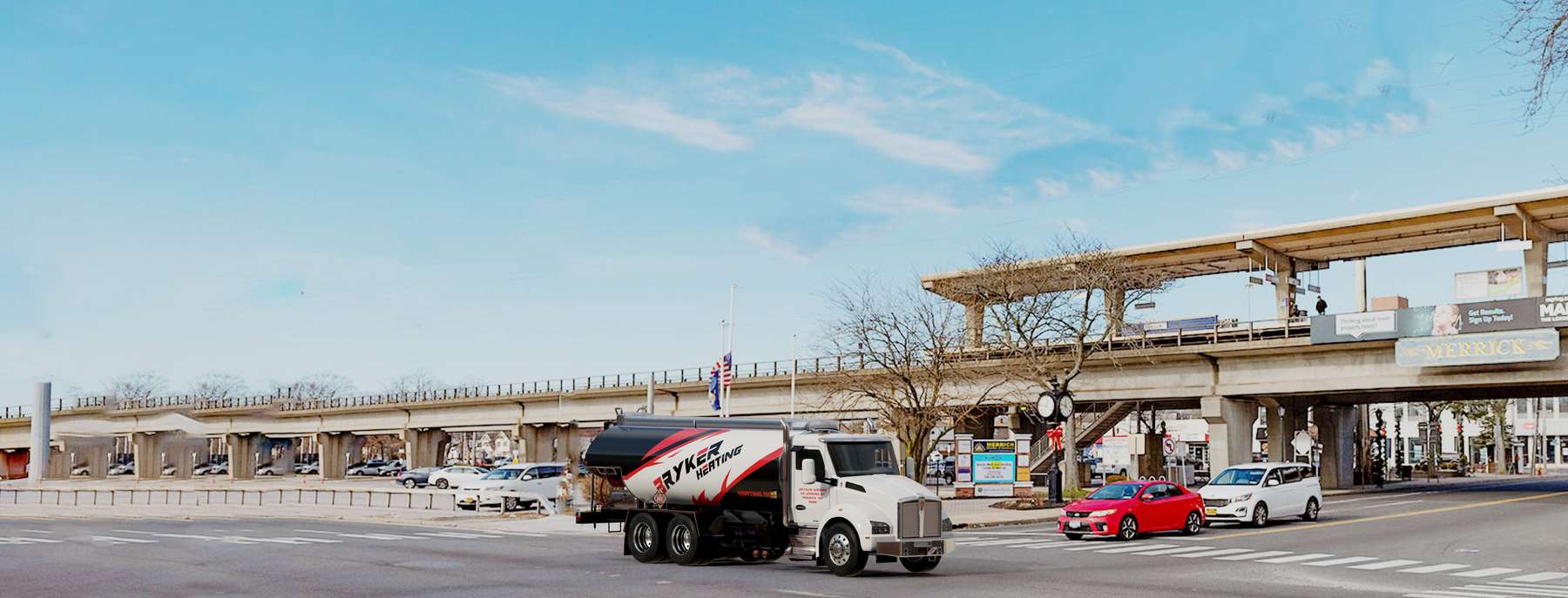 Bryker Heating Heating Oil Truck Bryker Heating residential home heating oil truck in front of a railroad bridge in Merrick, Long Island, New York delivering fuel oil.