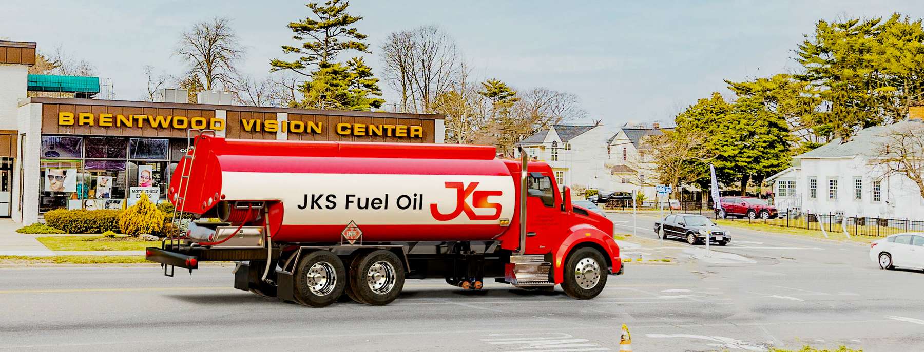 Jarzombek Energy Heating Oil Truck Jarzombek Energy residential home heating oil truck in front of a large 5 bedroom stucco home in Calverton, Long Island, New York delivering fuel oil.
