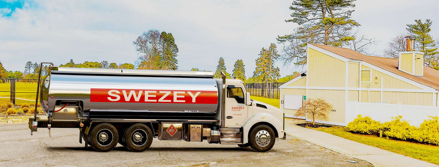 Allyn NY Heating Oil Truck Allyn NY residential home heating oil truck parked in a driveway in Bethpage, Long Island, New York delivering fuel oil.