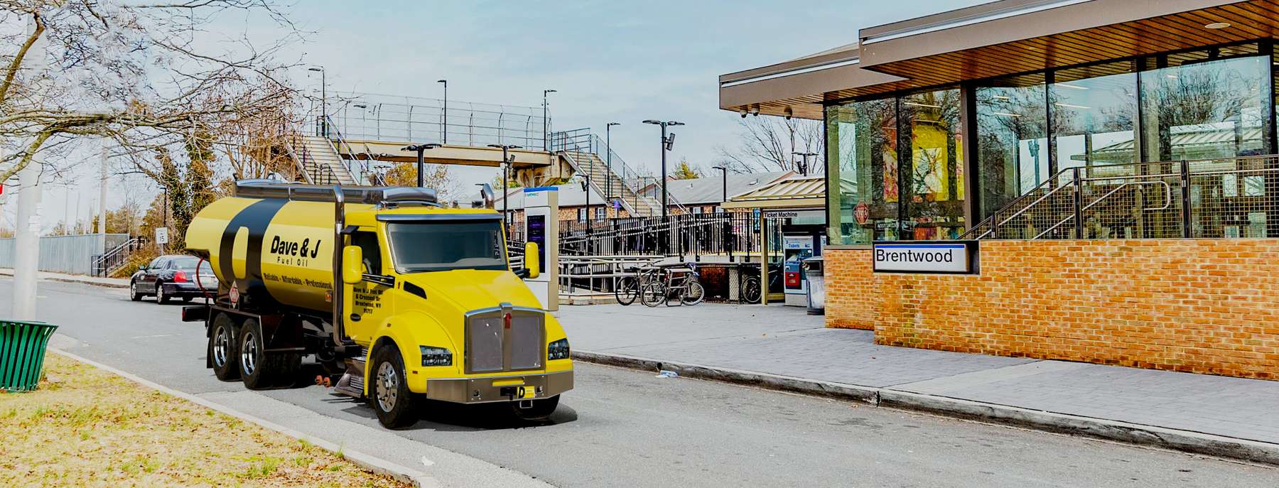 D. J. Oil Heating Oil Truck  D. J. Oil residential home heating oil truck on a 3 lane road with traffic in Lindenhurst, Long Island, New York delivering fuel oil.