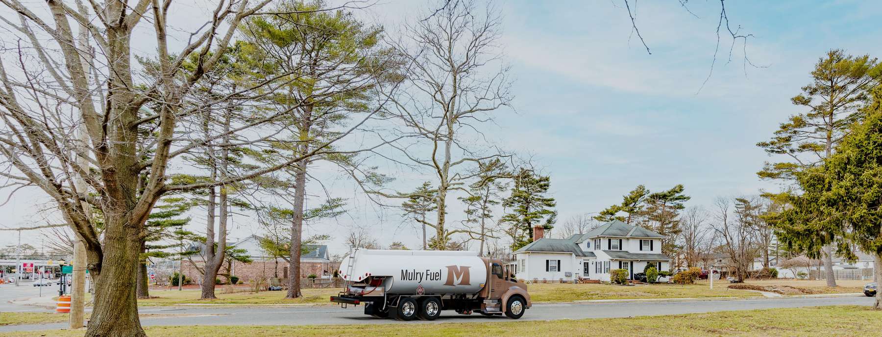 Mulry Fuel Heating Oil Truck Mulry Fuel residential home heating oil truck on a sunny afternoon parked on Coxtie Green Rd in Brentwood, Long Island, New York delivering fuel oil.