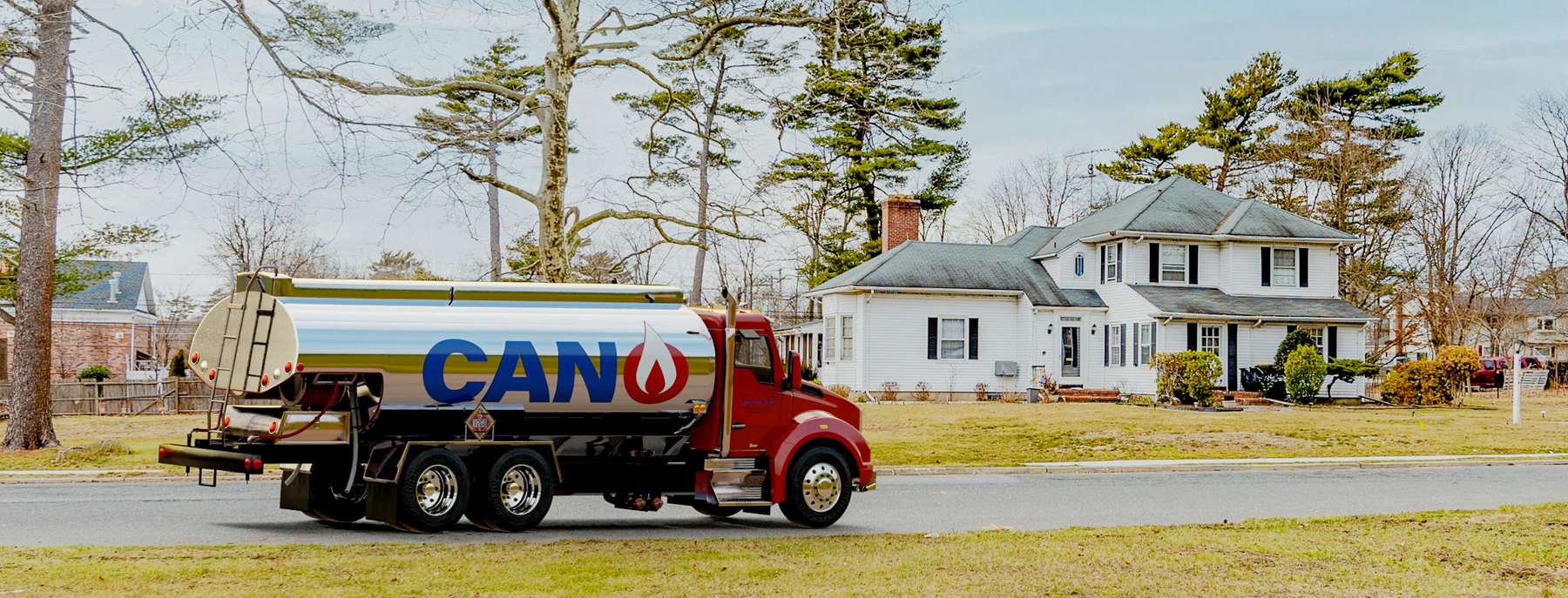 Danek Discount Fuel Heating Oil Truck Danek Discount Fuel residential home heating oil truck parked in front of a modern building in Bohemia, Long Island, New York delivering fuel oil.