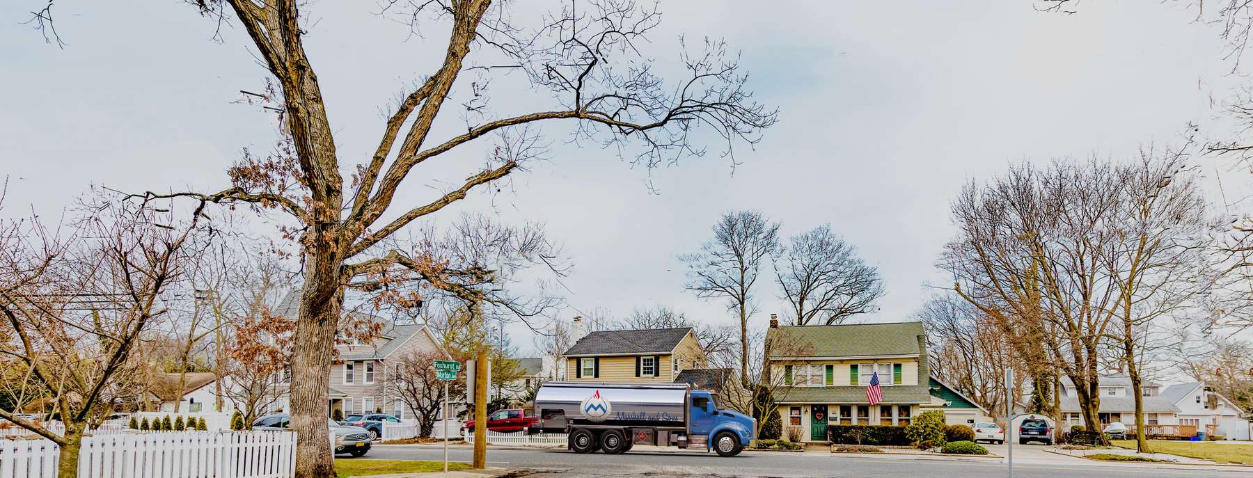 Marshall & Sons Heating Oil Truck Marshall & Sons residential home heating oil truck at the intersection of Foxhurst Road and Morton Ave in Oceanside, Long Island, New York delivering fuel oil.