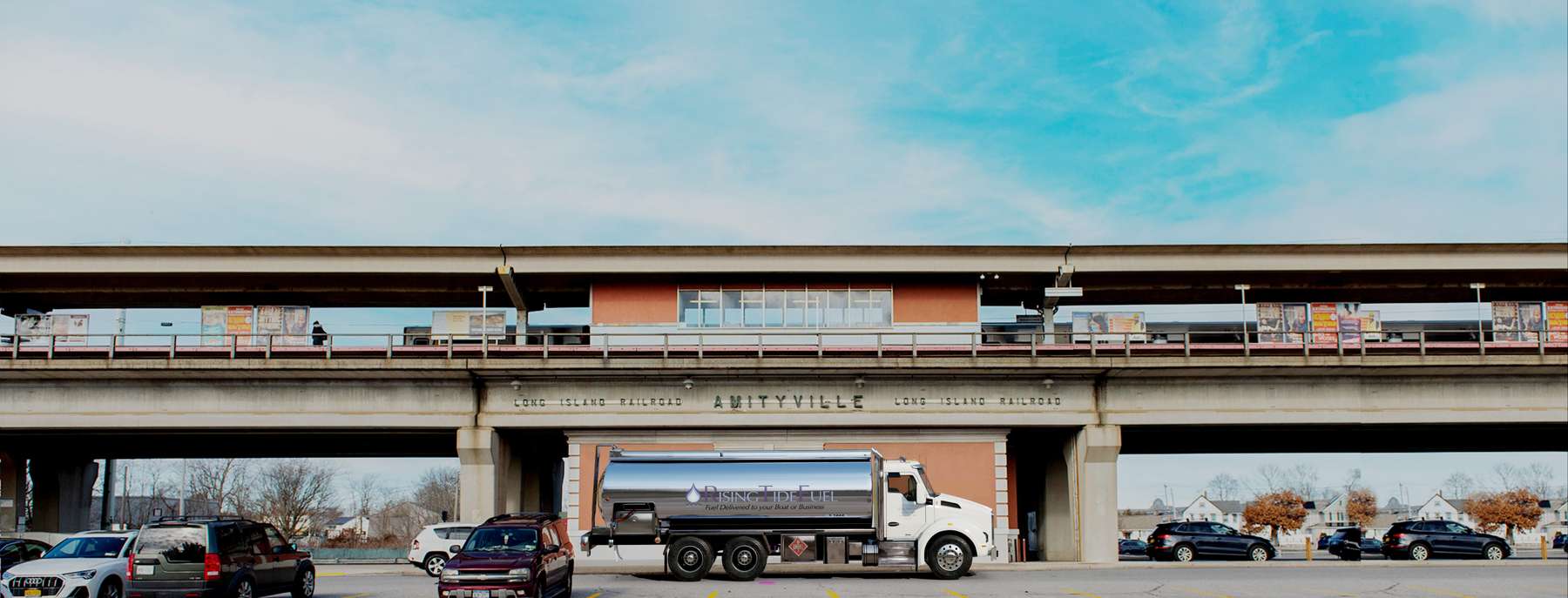 Rising Tide Fuel Heating Oil Truck Rising Tide Fuel residential home heating oil truck at the Long Island RR terminal in Amityville, Long Island, New York delivering fuel oil.