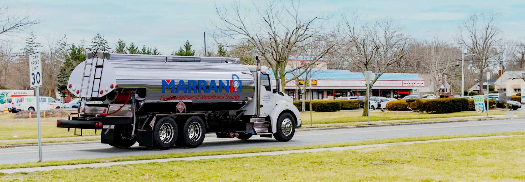 Marran Oil Heating Oil Truck Marran Oil residential home heating oil truck on a road adjacent to a shopping center in Holtsville, Long Island, New York delivering fuel oil.