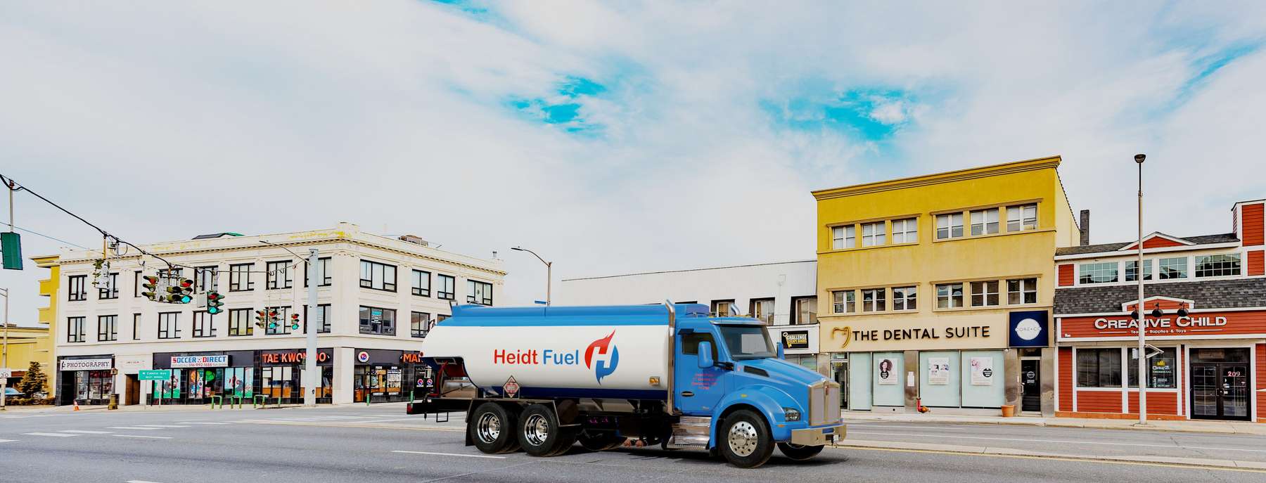 Great River Fuel Oil Heating Oil Truck Great River Fuel Oil residential home heating oil truck Saxon cove luxury community in Islip Terrace, Long Island, New York delivering fuel oil.