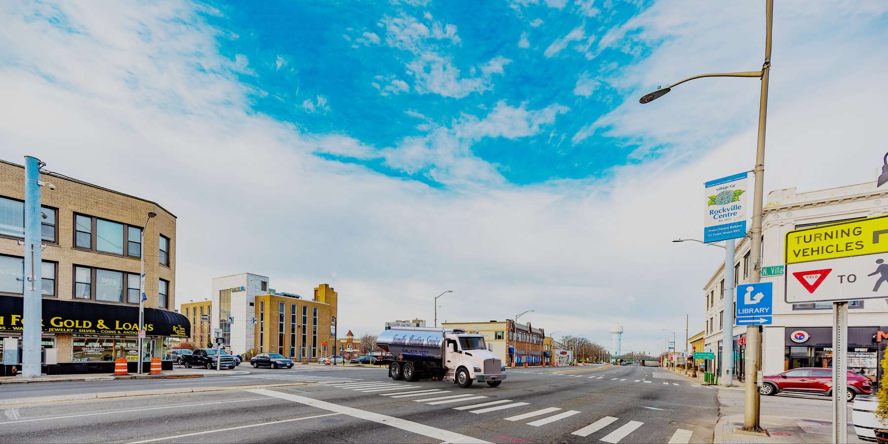 Residential heating oil truck at the intersection of North Village Ave and Route 27 in Rockville Centre, Long Island, New York delivering fuel oil. Residential heating oil truck at the intersection of North Village Ave and Route 27 in Rockville Centre, Long Island, New York delivering fuel oil.