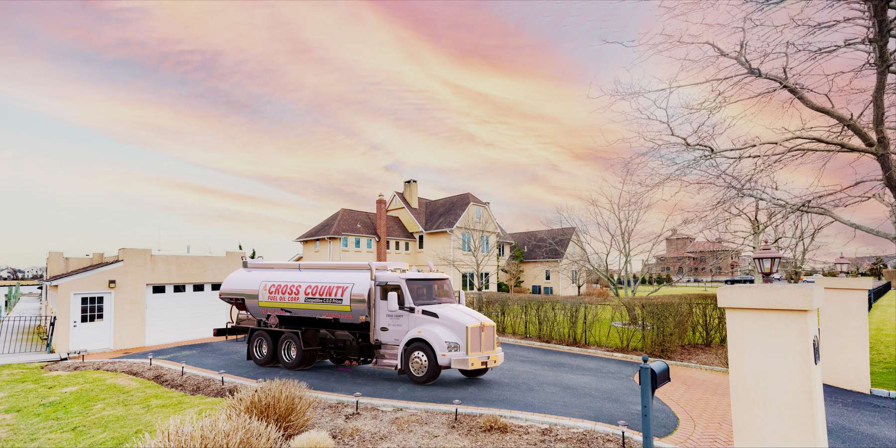 Residential heating oil truck with a fantastic sunset view of a beachfront luxury home in North Babylon, Long Island, New York delivering fuel oil. Residential heating oil truck with a fantastic sunset view of a beachfront luxury home in North Babylon, Long Island, New York delivering fuel oil.