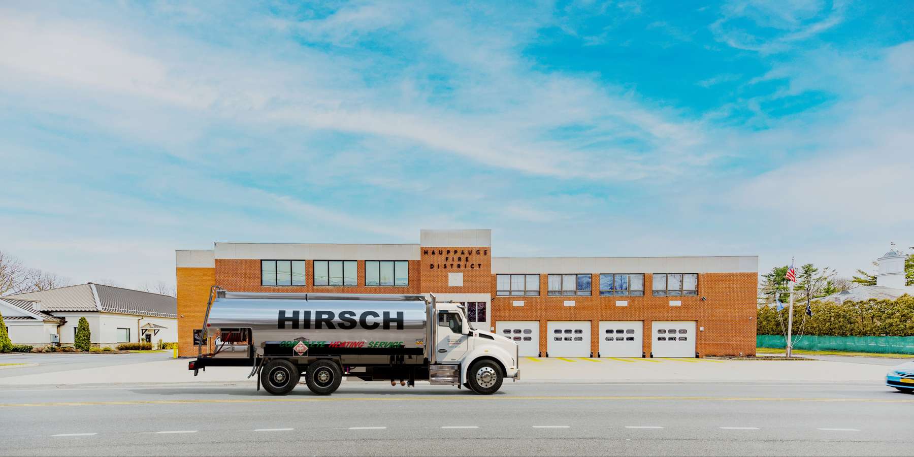 Residential heating oil truck on Wheeler Rd in Hauppauge, Long Island, New York delivering fuel oil. Residential heating oil truck on Wheeler Rd in Hauppauge, Long Island, New York delivering fuel oil.