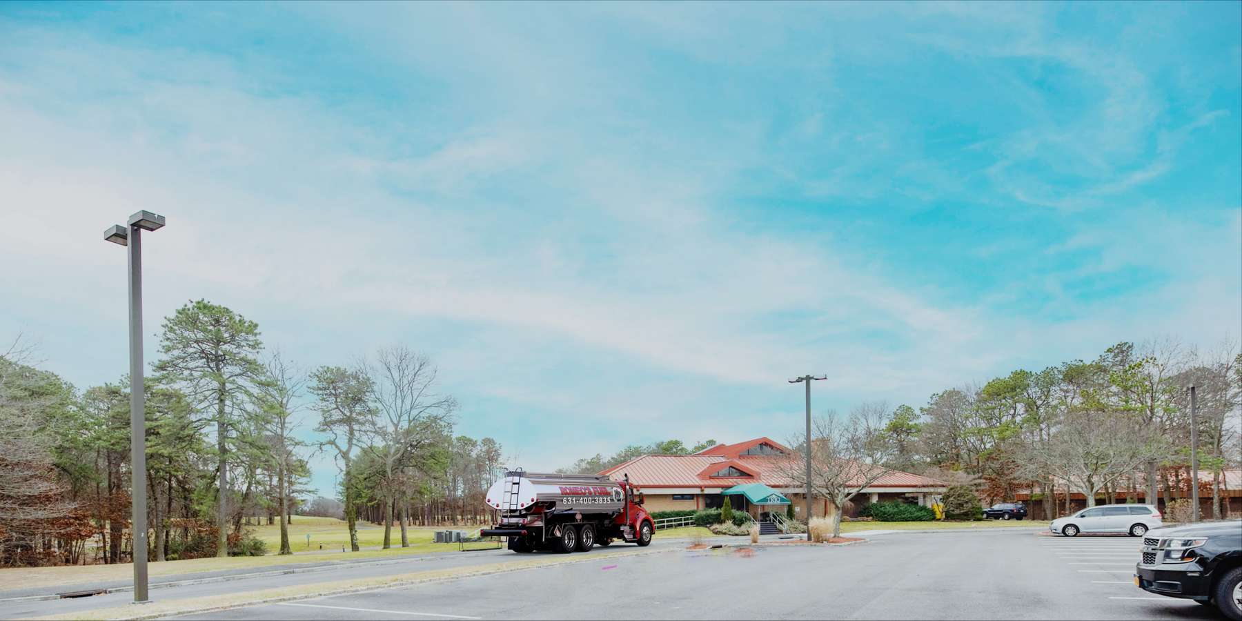 Residential heating oil truck in the Trio cafe parking lot in Holbrook, Long Island, New York delivering fuel oil. Residential heating oil truck in the Trio cafe parking lot in Holbrook, Long Island, New York delivering fuel oil.