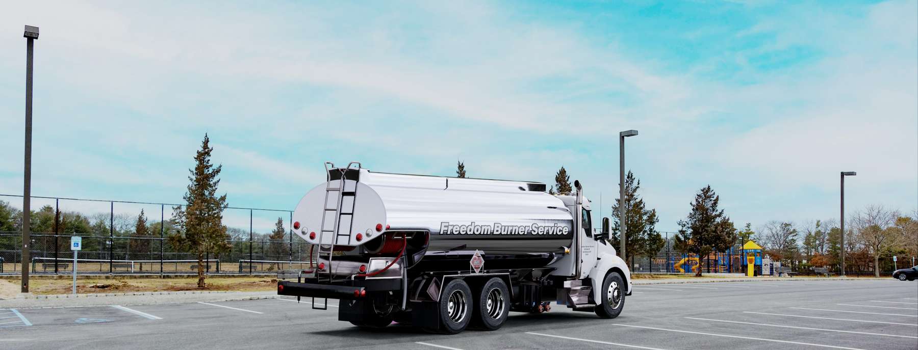 Freedom Burner Service Heating Oil Truck Freedom Burner Service residential home heating oil truck in a parking lot in Mount Sinai, Long Island, New York delivering fuel oil.