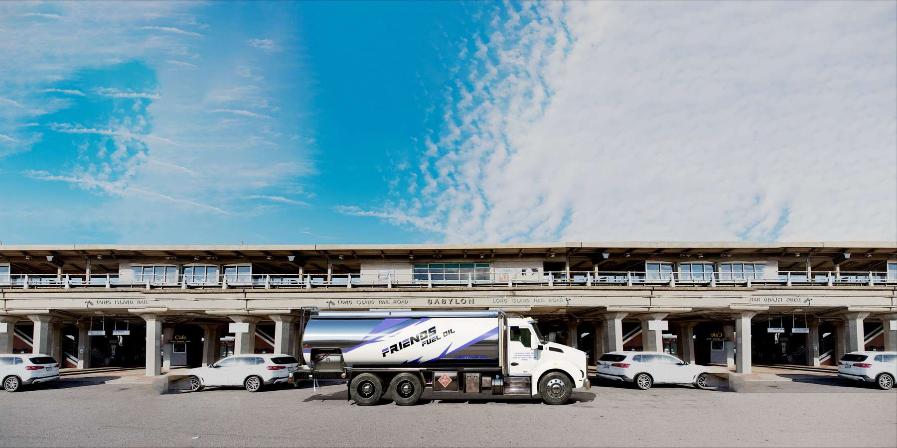 Babylon, Long Island, NY Heating Oil Truck Residential heating oil truck at the LIRR station in Babylon, Long Island, New York delivering fuel oil.
