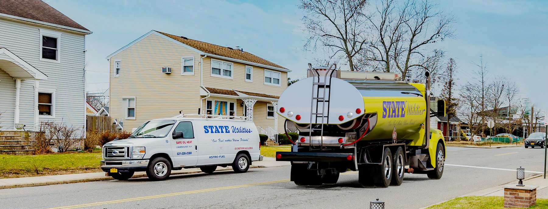 State Utilities Heating Oil Truck State Utilities residential home heating oil truck with a service van in Bethpage, Long Island, New York delivering fuel oil.