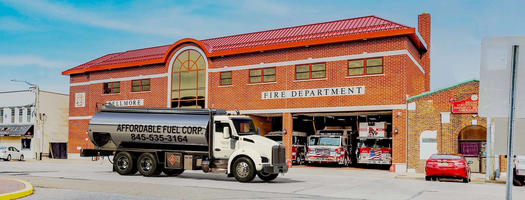 Affordable Fuel Heating Oil Truck  Affordable Fuel residential home heating oil truck parked in front of the fire district building in Bellmore, Long Island, New York delivering fuel oil.