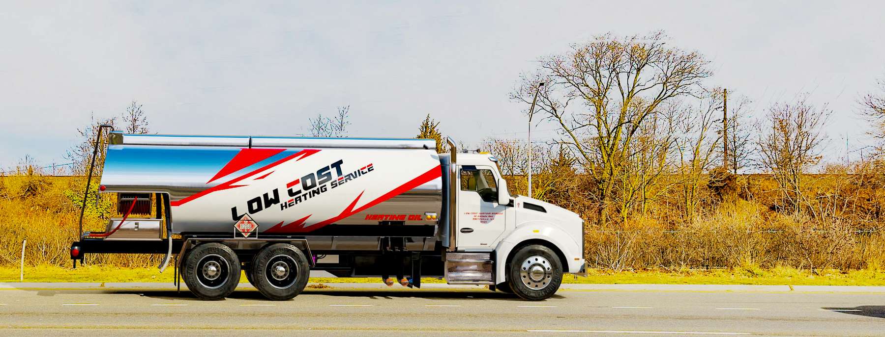Low Cost Heating Service Heating Oil Truck Low Cost Heating Service residential home heating oil truck at sunset in Bellmore, Long Island, New York delivering fuel oil.