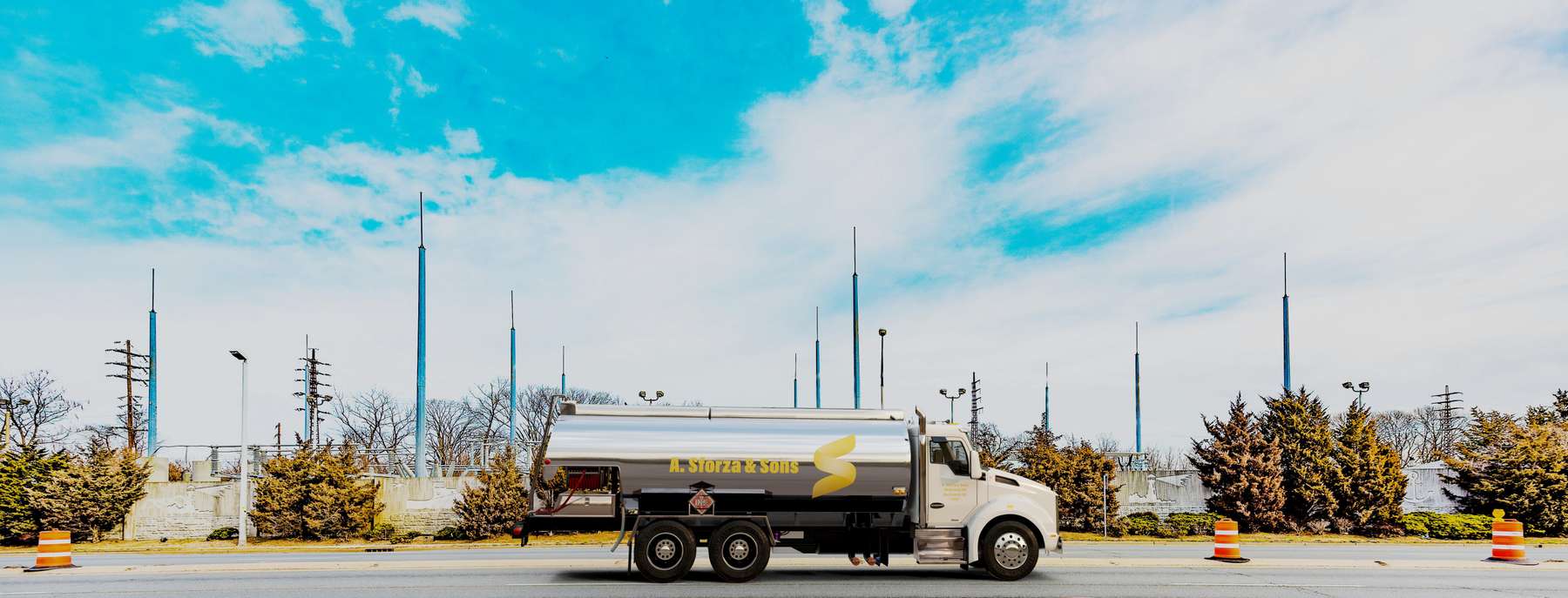 A. Sforza & Sons Heating Oil Truck A. Sforza & Sons residential home heating oil truck in front of the electric station in Freeport, Long Island, New York delivering fuel oil.