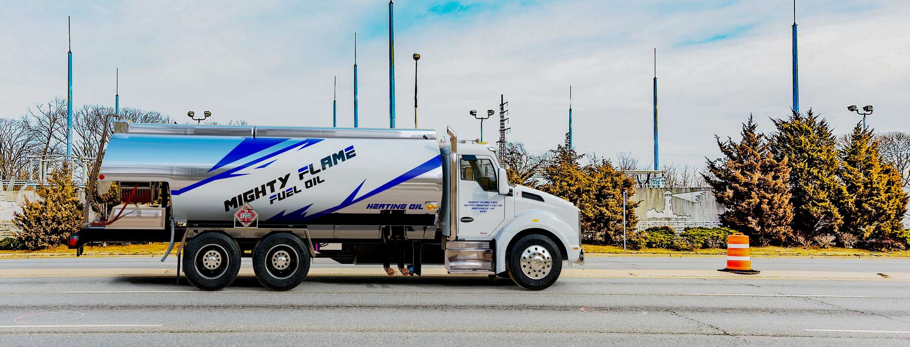 Mulry Fuel Heating Oil Truck Mulry Fuel residential home heating oil truck on a sunny afternoon parked on Coxtie Green Rd in Brentwood, Long Island, New York delivering fuel oil.