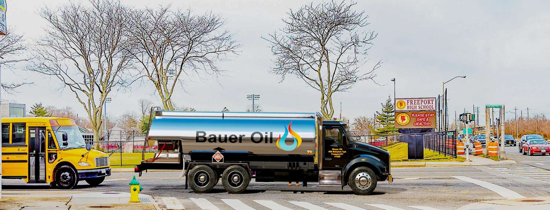 Blue Flame Fuel Heating Oil Truck  Blue Flame Fuel residential home heating oil truck in front of the middle school in Shirley, Long Island, New York delivering fuel oil.