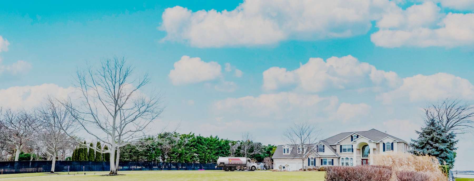 Yellow Trading Heating Oil Truck Yellow Trading residential home heating oil truck in front of the Rudolph M Kammerer Public Works Building in Yaphank, Long Island, New York delivering fuel oil.