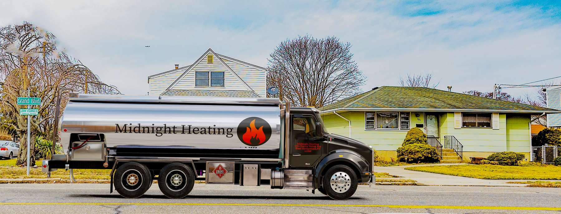 Mulry Fuel Heating Oil Truck Mulry Fuel residential home heating oil truck on a sunny afternoon parked on Coxtie Green Rd in Brentwood, Long Island, New York delivering fuel oil.