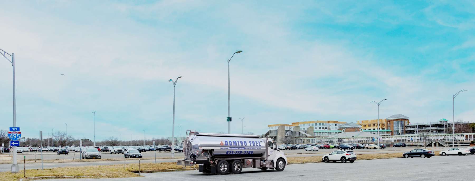 Domino Fuel Heating Oil Truck Domino Fuel residential home heating oil truck in a parking lot in Ronkonkoma, Long Island, New York delivering fuel oil.