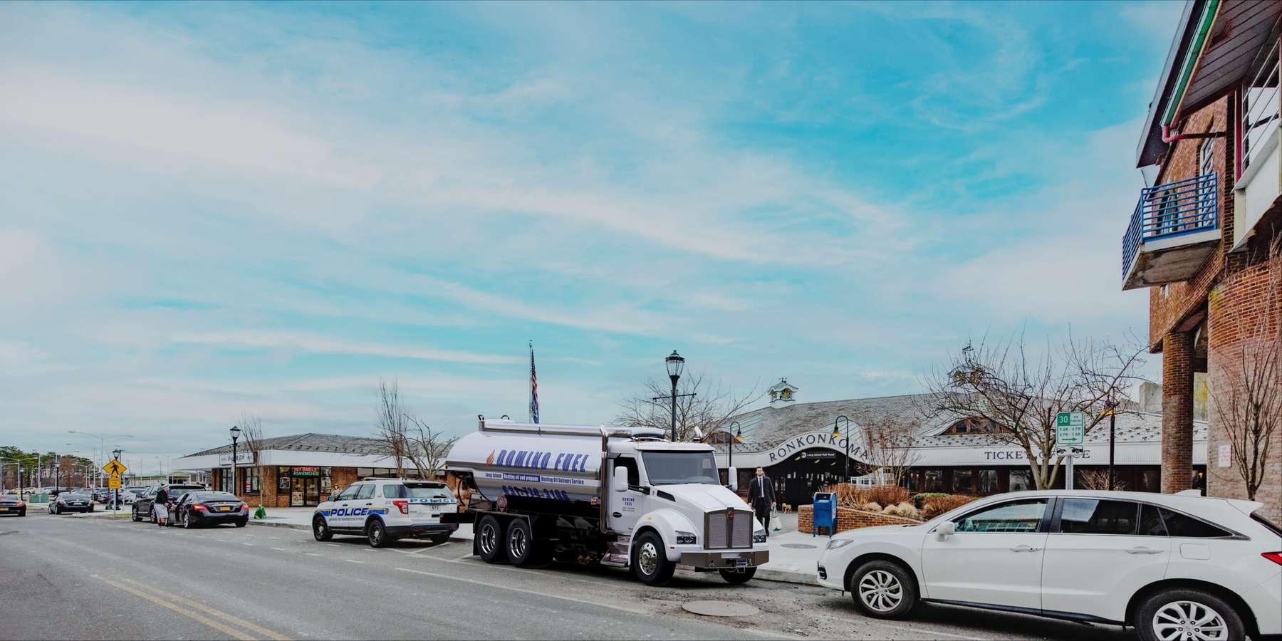 Residential heating oil truck downtown in Ronkonkoma, Long Island, New York delivering fuel oil. Residential heating oil truck downtown in Ronkonkoma, Long Island, New York delivering fuel oil.