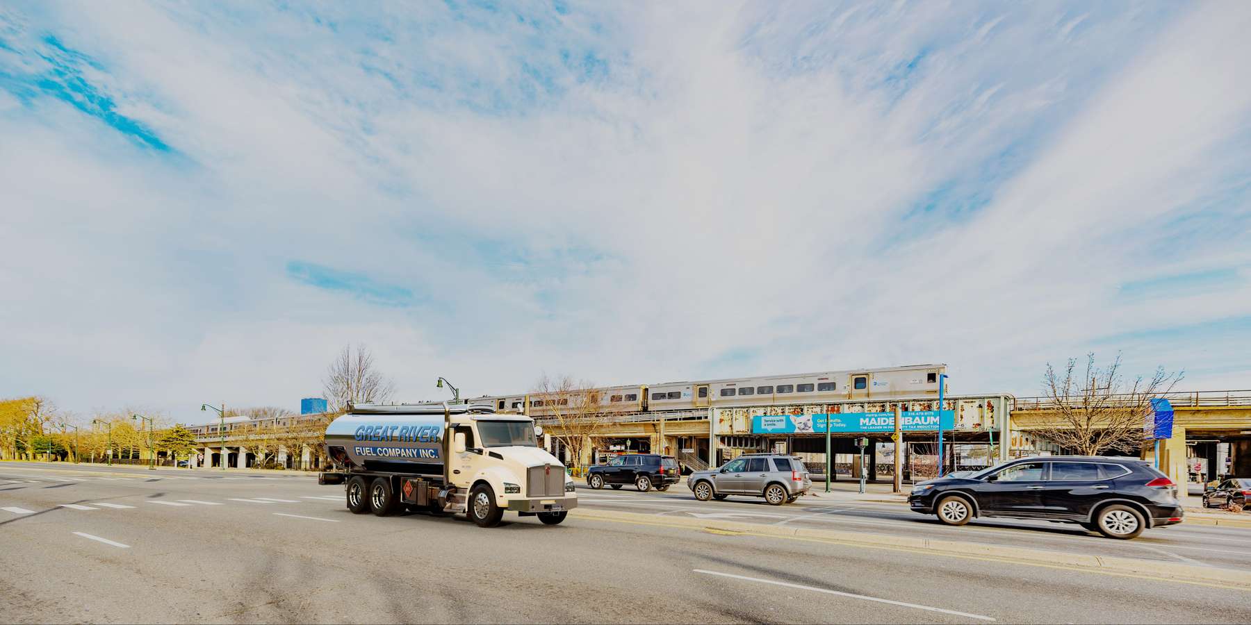 Residential heating oil truck at the intersection of Sunrise Highway and Peninsula Blvd in Islip, Long Island, New York delivering fuel oil. Residential heating oil truck at the intersection of Sunrise Highway and Peninsula Blvd in Islip, Long Island, New York delivering fuel oil.