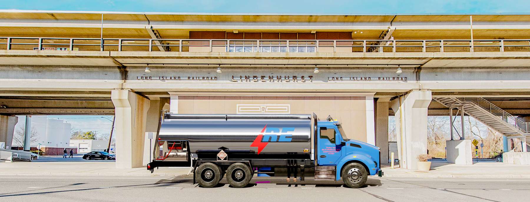 Quogue Sinclair Fuel Heating Oil Truck  Quogue Sinclair Fuel residential home heating oil truck parked in front of a white tudor mansion on Weald Road in Brentwood, Long Island, New York delivering fuel oil.